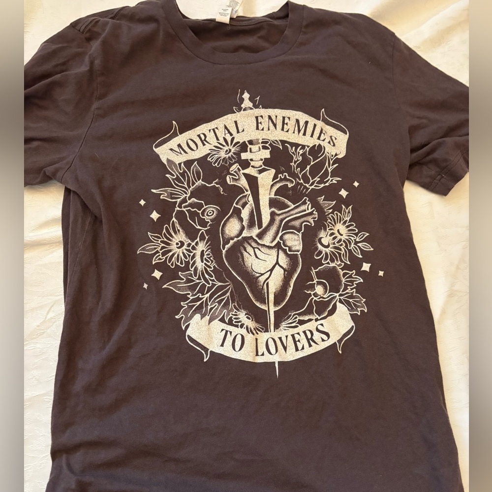 Brown tshirt with heart and dagger graphic